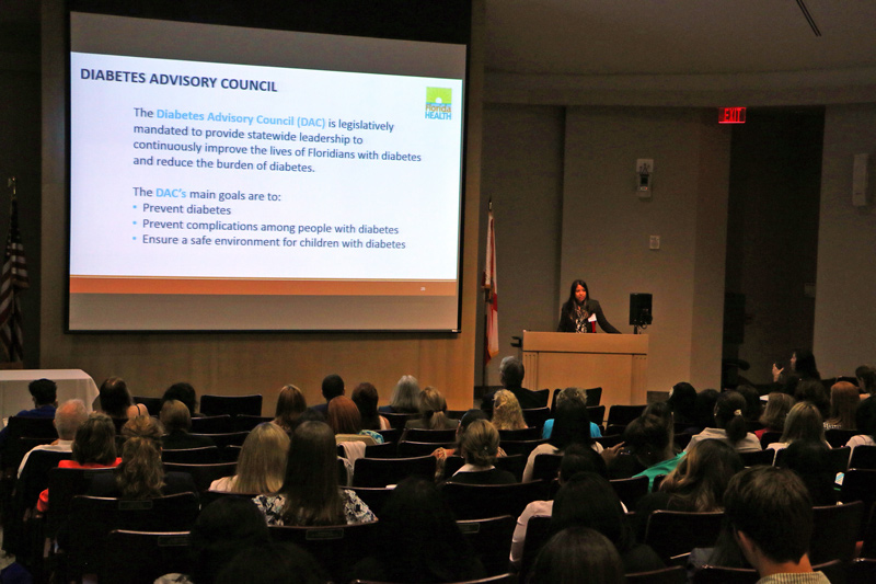 Dr.-Philip-presentation-with-audience